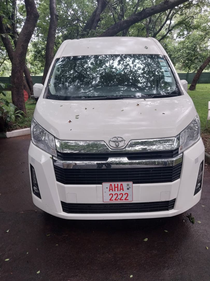 Air-conditioned Munzila Safaris transfer vehicle in Victoria Falls
